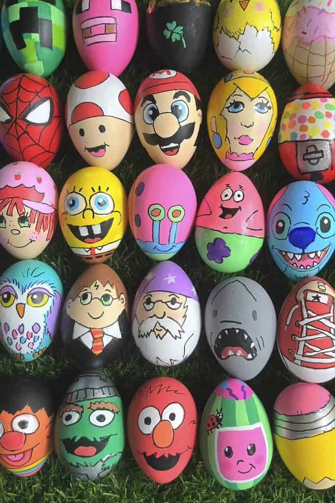 Decorative Easter eggs with hand-drawn cartoon characters and vibrant colors.
