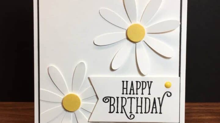 Handmade birthday card with daisy flower design and 'Happy Birthday' message.