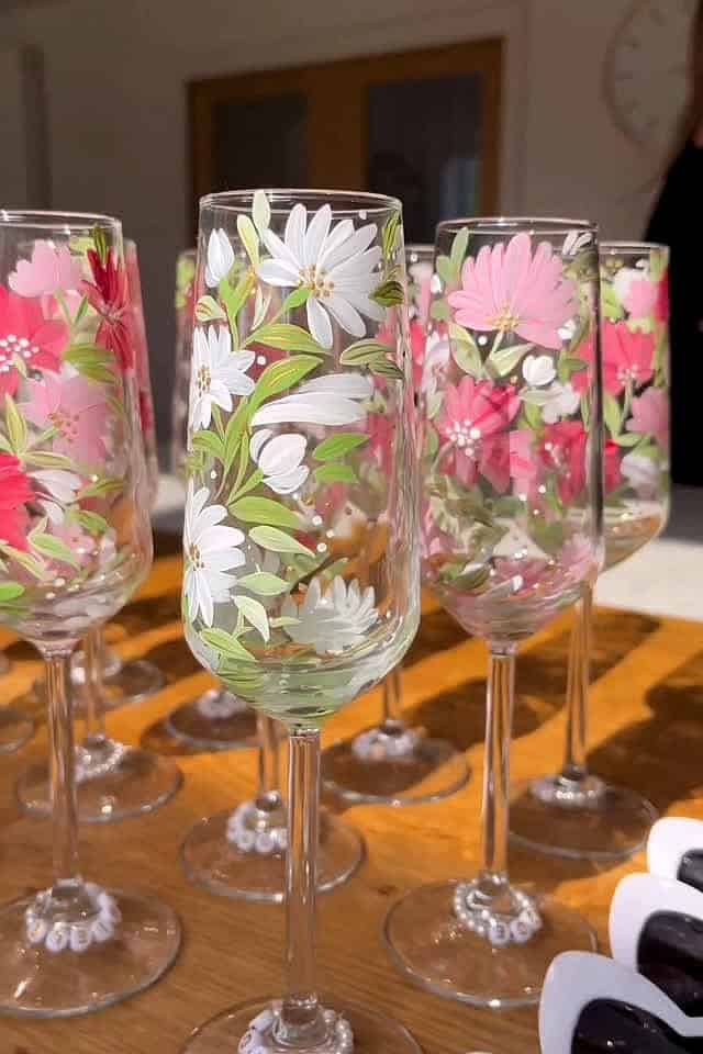 Beautiful hand-painted floral decorated wine glasses for special occasions.