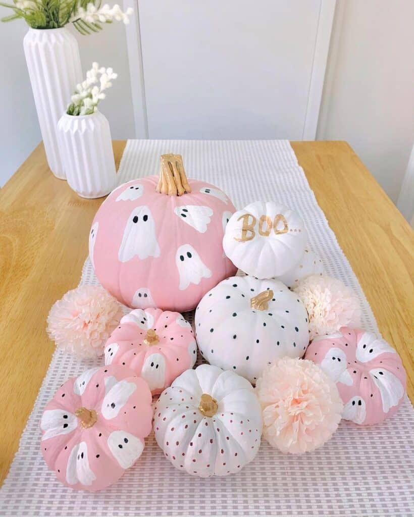 Decorative pink and white pumpkins with ghost and Boo accents for fall.