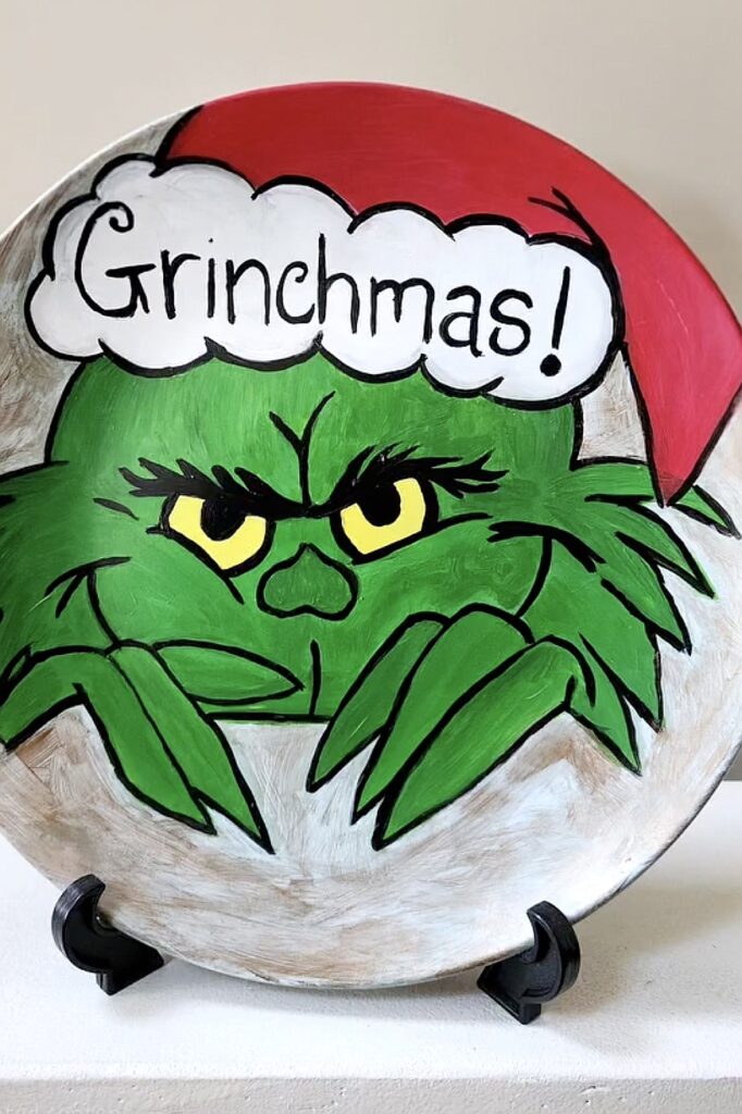 Festive plate featuring the Grinch with a Santa hat and 'Grinchmas!' message.